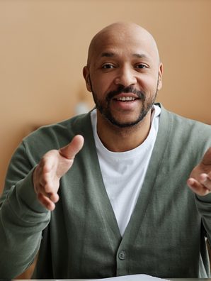 Creator gesturing to camera, captioned short
